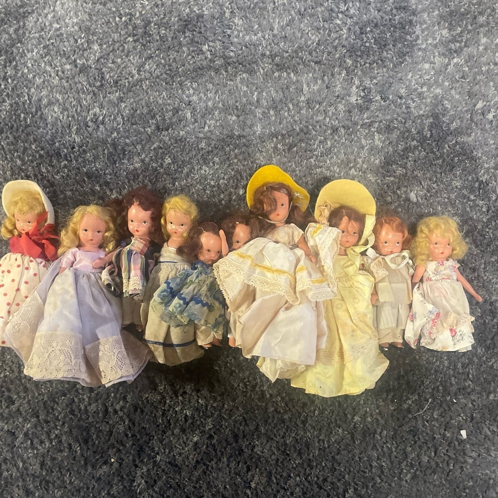 10 Vintage Nancy Ann Storybook dolls with assorted outfits